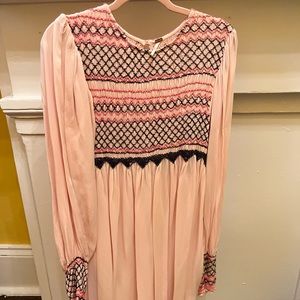 Free people pink smocked top and sleeve. Size M